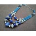 Necklace Patsyorka of ceramic beads turquoise 3 threads